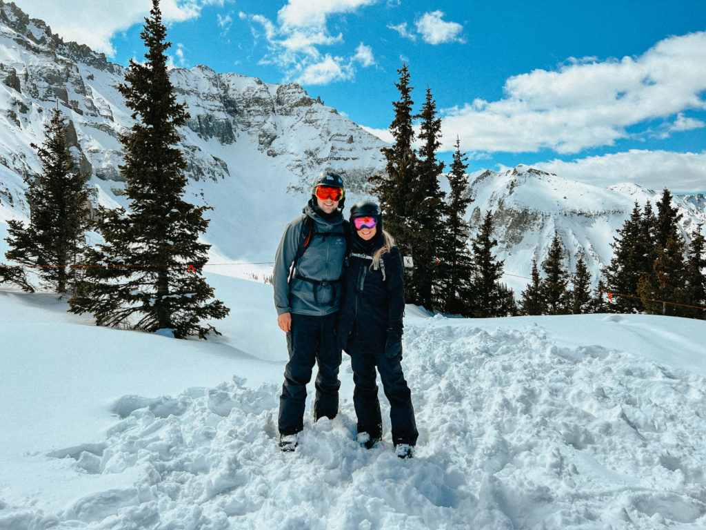 Epic or Ikon Pass: Which Ski Pass is Better? Abby and Sam smiling at Telluride.