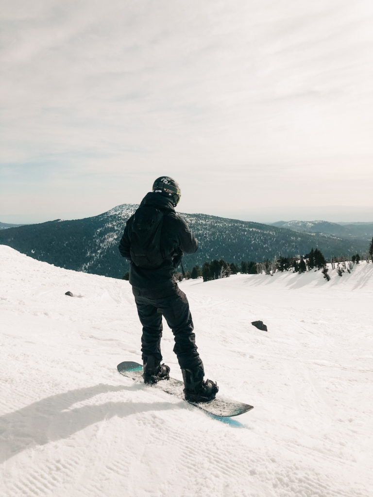 Sam snowboarding on the mountain.