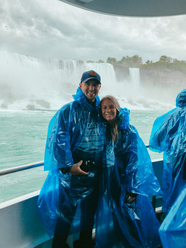 Sam and Abby enjoying a boat tour of Niagara Falls, one of their best tips for visiting Niagara Falls.