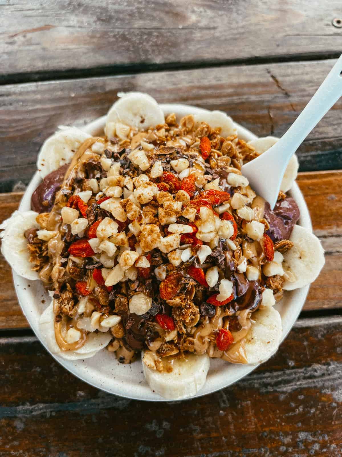 A delicious acai bowl with several toppings. 