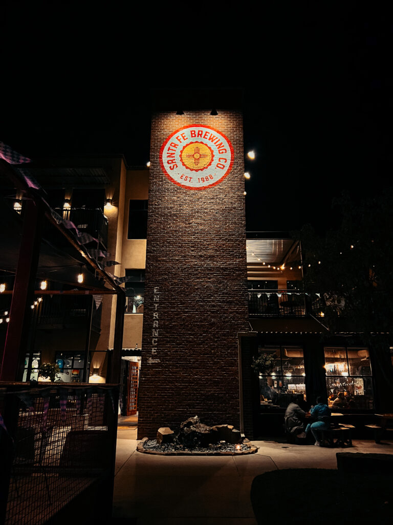 Santa Fe Brewing Company lit up at night.