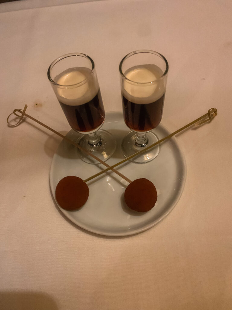 Two delicious drinks served with chocolate. 