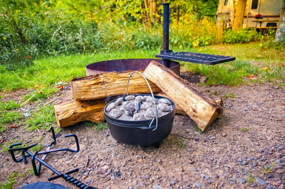 One example of how to bake over a campfire is by using a dutch oven to retain heat and cook the baked goods evenly!