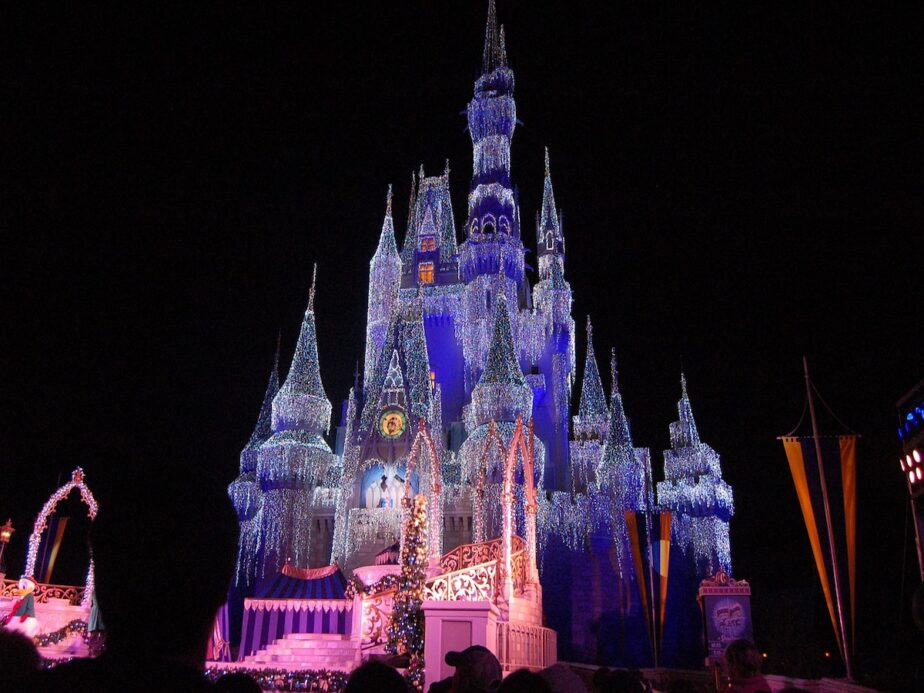 The Disney Castle decked out in Christmas lights, one of the best places to go for Christmas in the South.