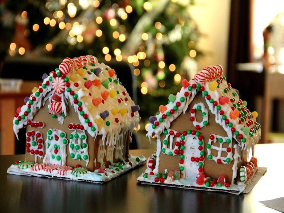 Gingerbread houses displayed on a table.