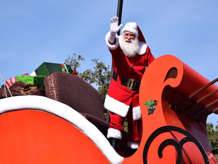 Santa on a sleigh during a Christmas Parade.