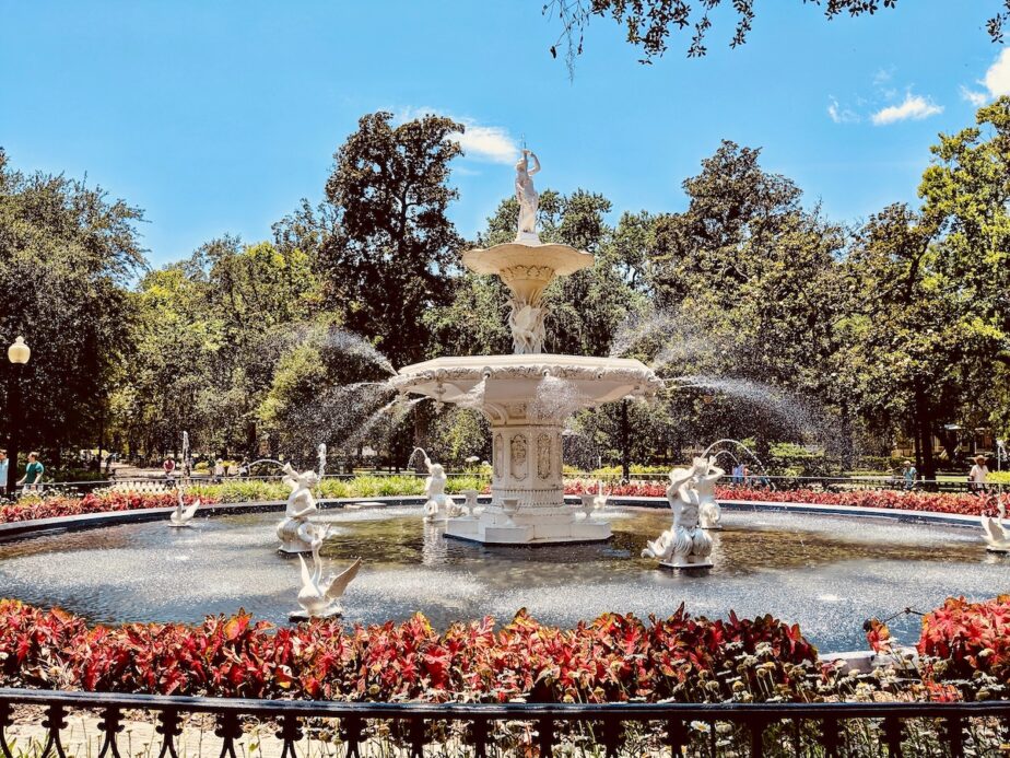 A fountain in Savannah with blue skies up above.