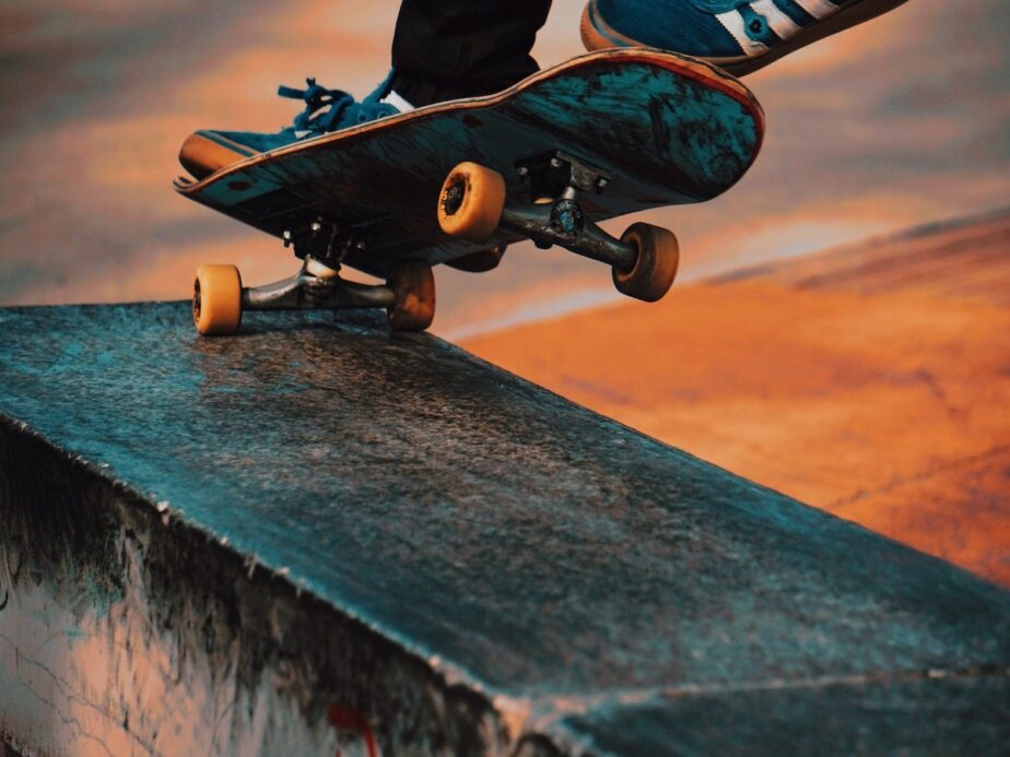A skateboarder going downhill.