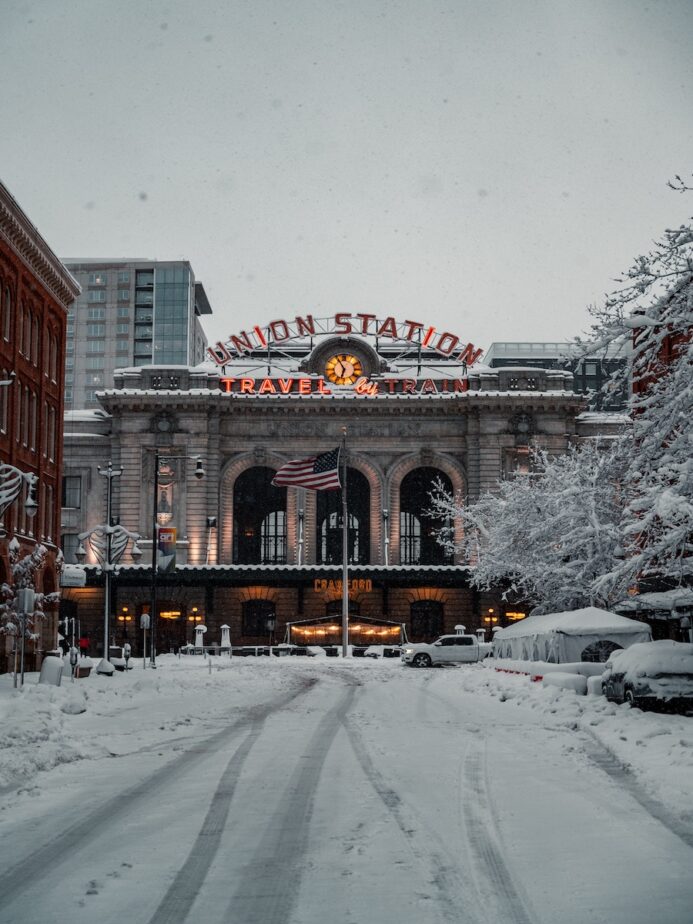 Union Station in downtown Denver with snowy roads.