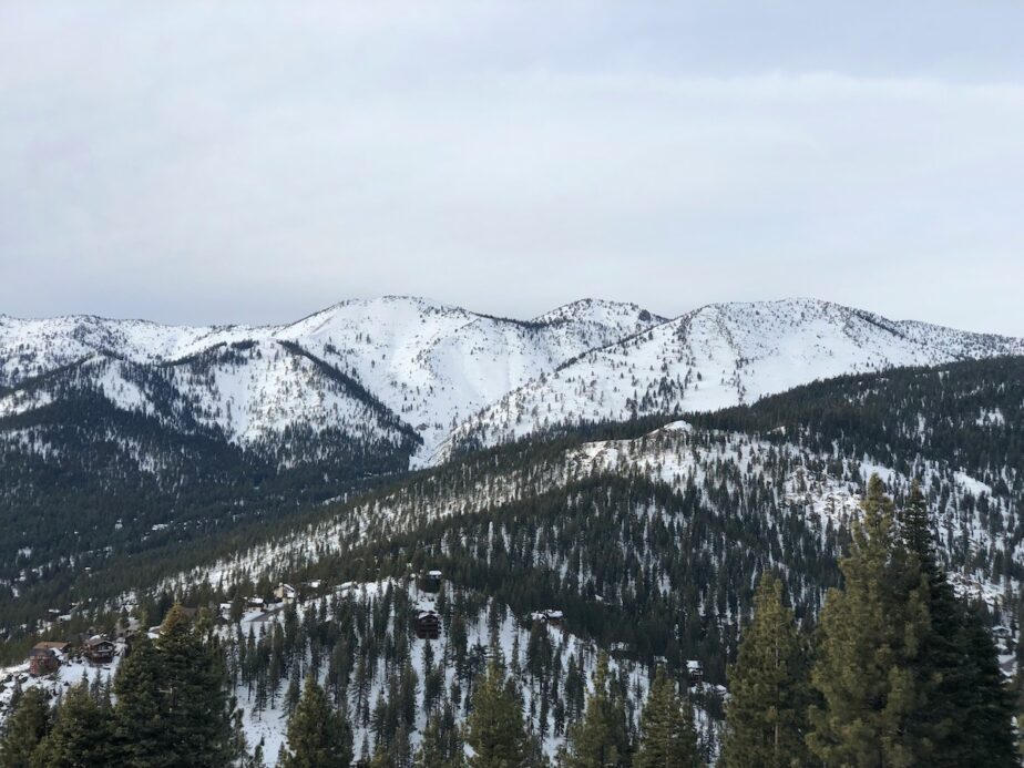 Snow covered mountains at one of the best Tahoe ski resorts for beginners.