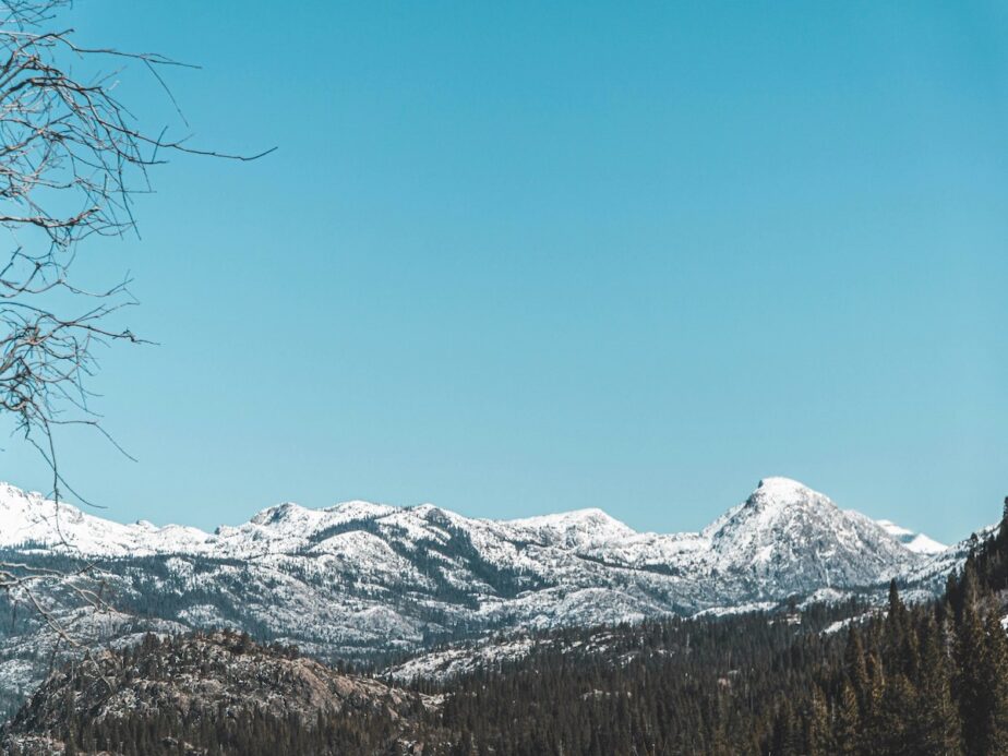 Snow covered mountains in the distance in Lake Tahoe.