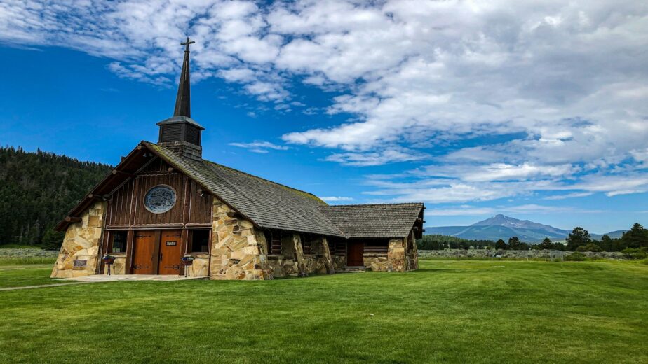 The Soldiers Chapel in Montana with partly cloudy skies.