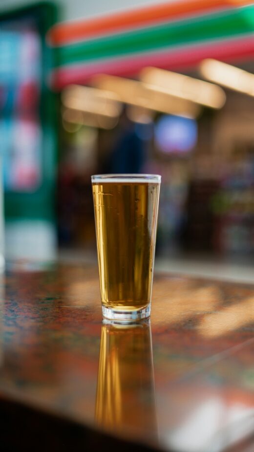 A craft beer served on a bar.