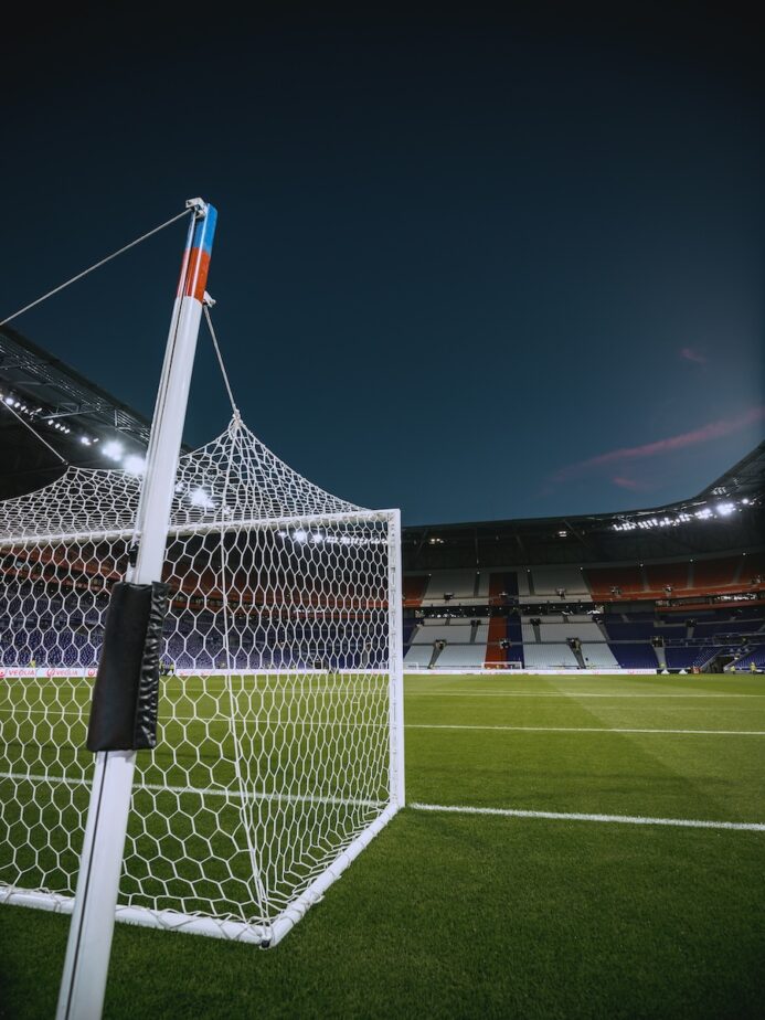 A soccer stadium in France at night.