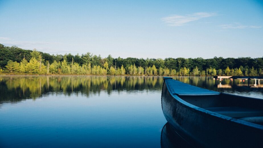 A lake with a canoe sitting on it in Montana.