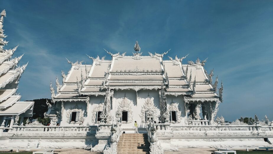 The White Temple in Thailand known for its bright white color and beautiful architecture.