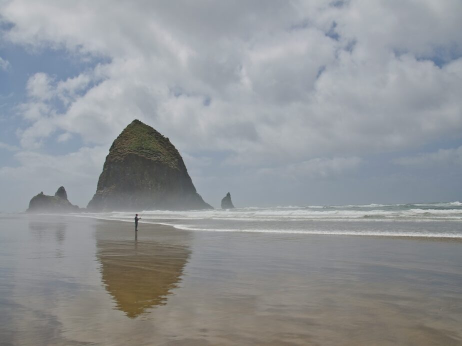 Cannon Beach in Oregon on a cloudy day.