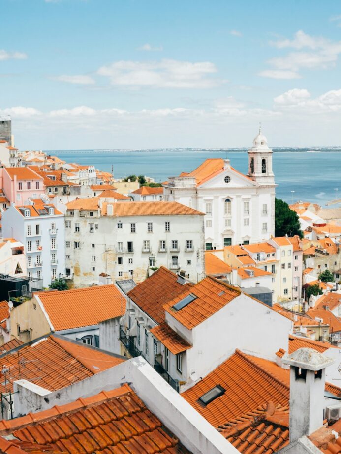 White buildings with orange roofs in Portugal.