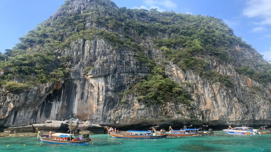 Krabi, Thailand with mountains and boats.