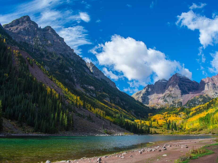 The Maroon Bells in Aspen surrounded by fall foliage.